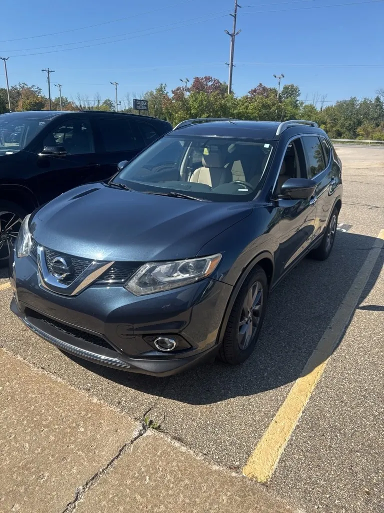 Blue 2016 Nissan Rogue SL for sale in Holland, MI