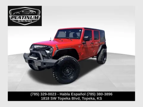 Red 2015 Jeep Wrangler Unlimited Sport for sale in Topeka, KS