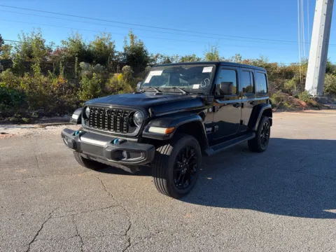 Photos of 2024 Jeep Wrangler Sahara 4xe for sale in Lithia Springs, GA at ALM Hyundai West