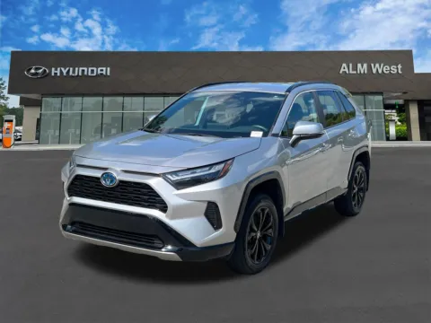 Silver 2023 Toyota RAV4 Hybrid SE for sale in Lithia Springs, GA