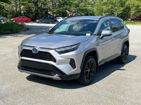 Silver 2023 Toyota RAV4 Hybrid SE for sale in Lithia Springs, GA