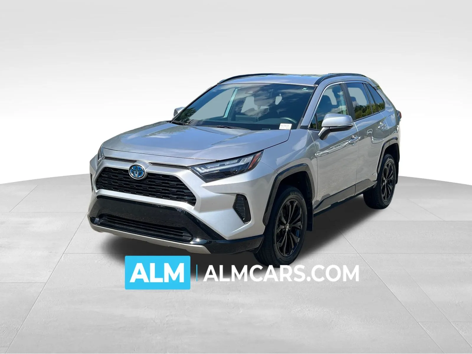 Silver 2023 Toyota RAV4 Hybrid SE for sale in Lithia Springs, GA