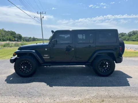 Photos of 2015 Jeep Wrangler Unlimited Sahara for sale in Martin, TN at Taylor Automotive