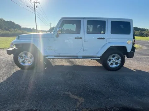 Photos of 2014 Jeep Wrangler Unlimited Sahara for sale in Martin, TN at Taylor Automotive