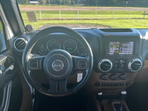 Another view of 2014 Jeep Wrangler Unlimited Sahara for sale in Martin, TN at Taylor Automotive