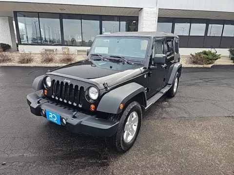 Black 2011 Jeep Wrangler Unlimited Sport for sale in Muncie, IN