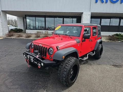 Red 2016 Jeep Wrangler Unlimited Sport for sale in Muncie, IN