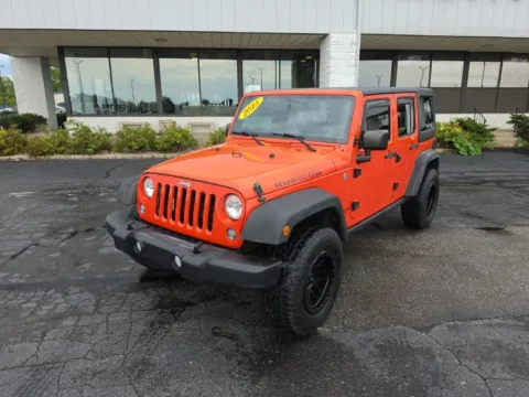 Orange 2015 Jeep Wrangler Unlimited Rubicon for sale in Muncie, IN