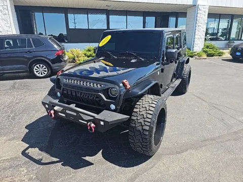 Black 2017 Jeep Wrangler Unlimited Sahara for sale in Muncie, IN