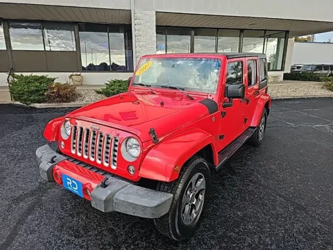 Red 2017 Jeep Wrangler Unlimited Sahara for sale in Muncie, IN