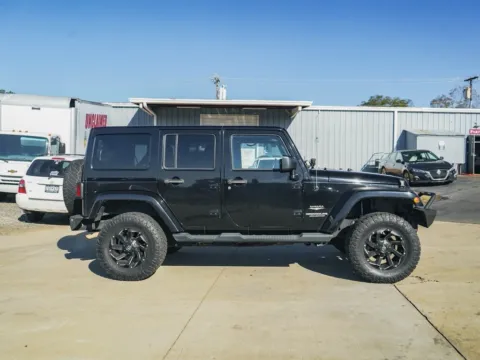 Another view of 2015 Jeep Wrangler Unlimited Sahara for sale in Moore, SC at TLC Motors