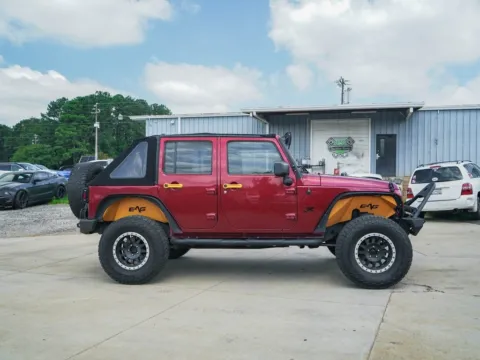 Another view of 2013 Jeep Wrangler Unlimited Sport for sale in Moore, SC at TLC Motors