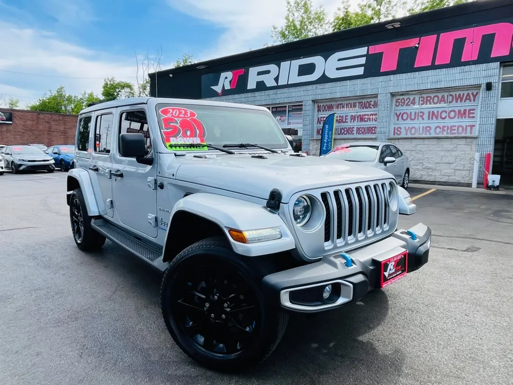 Silver 2023 JEEP WRANGLER SAHARA 4XE for sale in Merrillville, IN