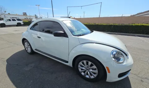 Another view of 2016 Volkswagen Beetle 1.8T S for sale in El Paso, TX at RightDrive - 8320 Gateway East