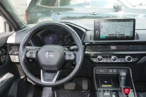 Photos of 2025 Honda CR-V Hybrid Sport Touring for sale in Salt Lake City, UT at Prestman Auto