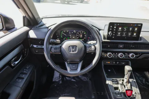 Photos of 2026 Honda CR-V Hybrid Sport Touring for sale in Salt Lake City, UT at Prestman Auto