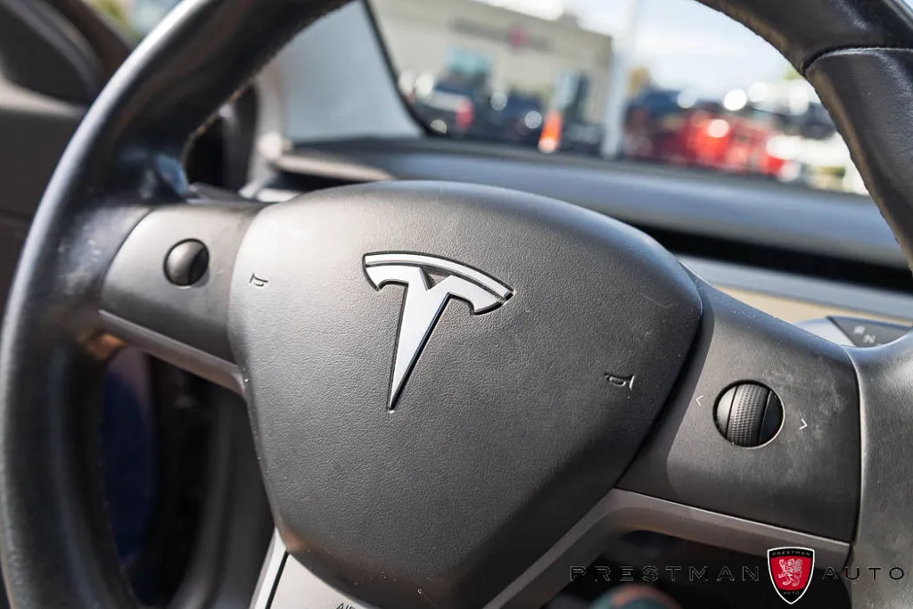 Tesla Model 3 photo 11