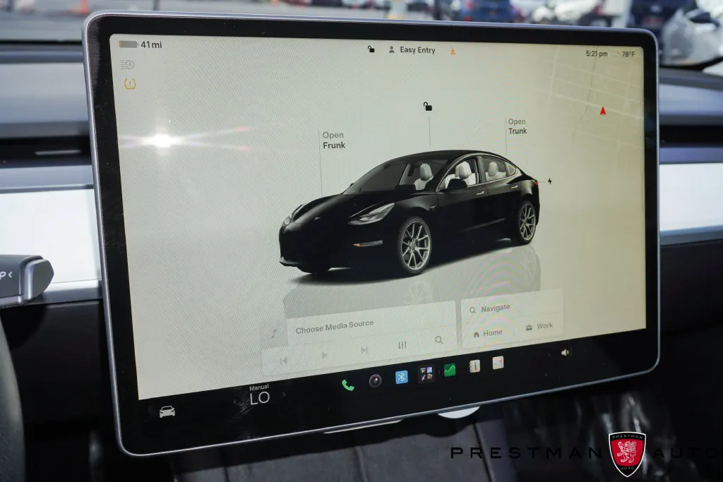 Tesla Model 3 photo 17
