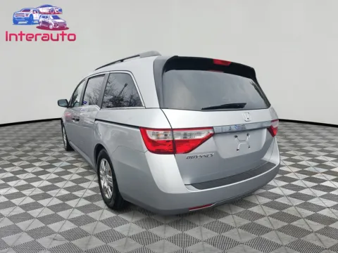 Another view of 2012 Honda Odyssey LX Minivan 4D for sale in Plainville, MA at Interauto