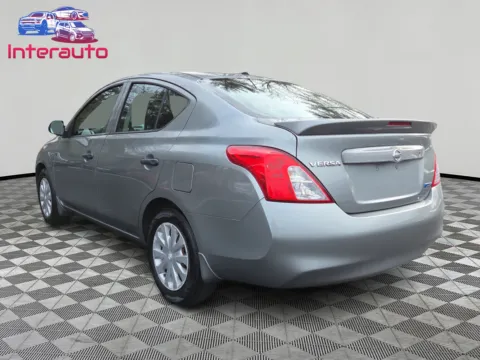 Another view of 2013 Nissan Versa S Plus Sedan 4D for sale in Plainville, MA at Interauto