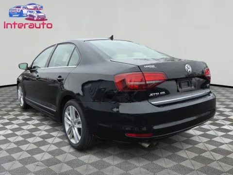 Another view of 2017 Volkswagen Jetta 1.8T SEL Sedan 4D for sale in Plainville, MA at Interauto