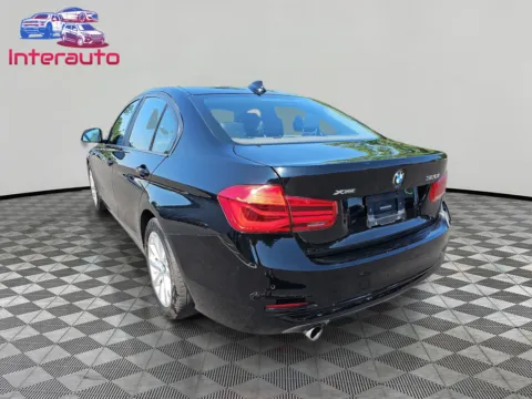 Another view of 2017 BMW 3 Series 320i xDrive Sedan 4D for sale in Plainville, MA at Interauto