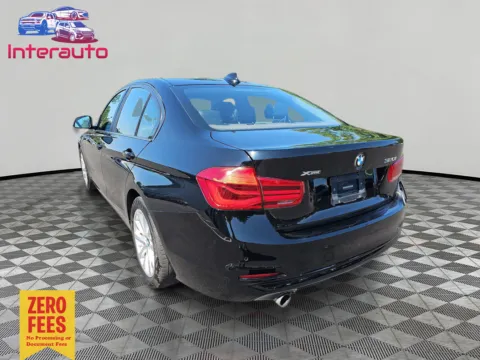 Another view of 2017 BMW 3 Series 320i xDrive Sedan 4D for sale in Plainville, MA at Interauto