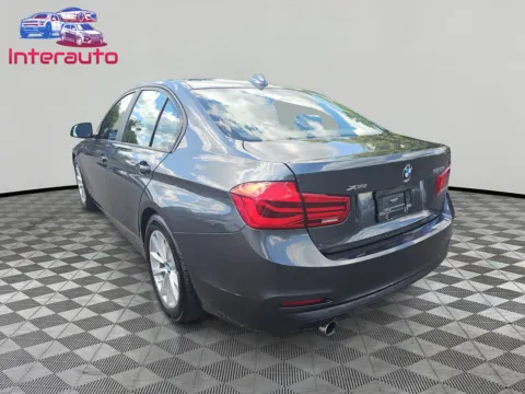 Another view of 2017 BMW 3 Series 320i xDrive Sedan 4D for sale in Plainville, MA at Interauto
