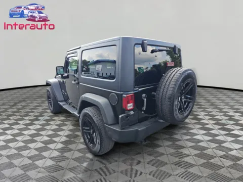 Another view of 2017 Jeep Wrangler Sport SUV 2D for sale in Plainville, MA at Interauto