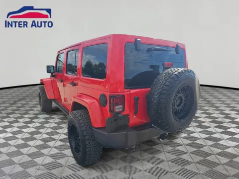 Another view of 2015 Jeep Wrangler Unlimited Altitude Sport Utility 4D for sale in Worcester, MA at Interauto