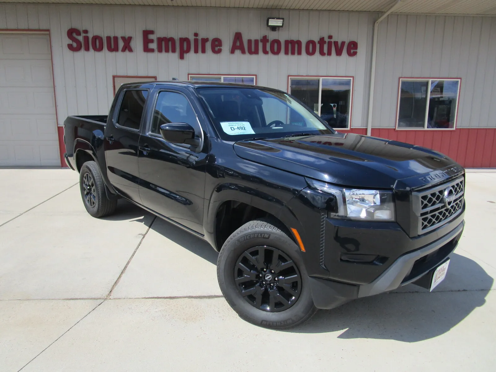 Black 2023 NISSAN FRONTIER SV for sale in Tea, SD