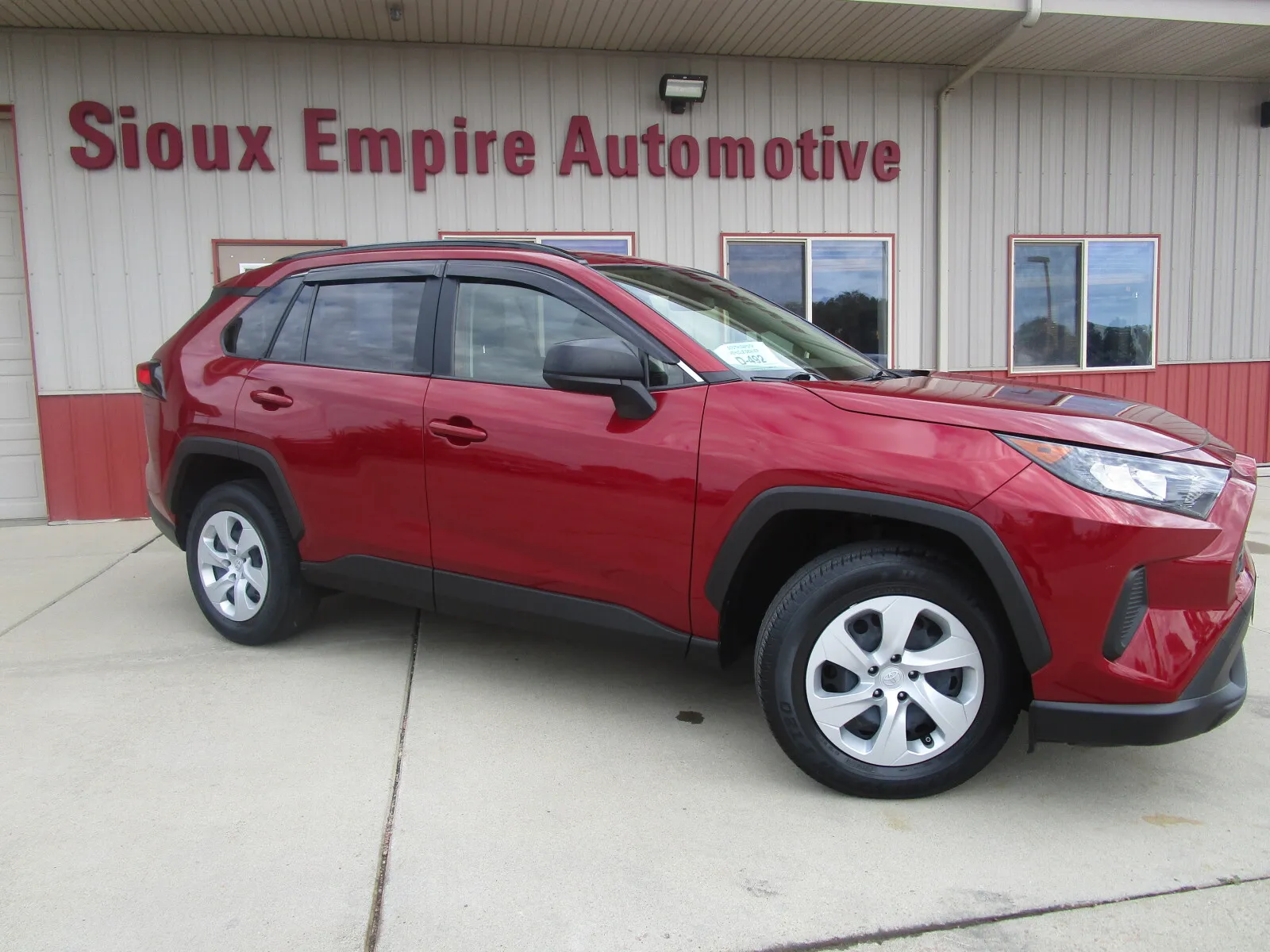 Red 2019 TOYOTA RAV4 LE for sale in Tea, SD
