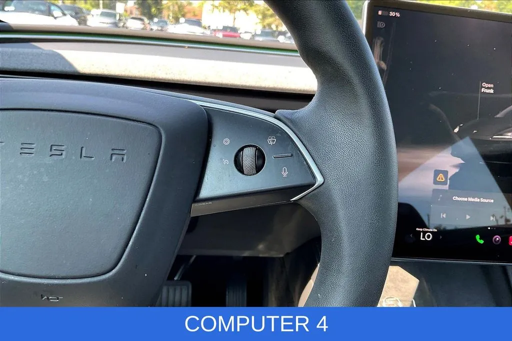 Tesla Model 3 photo 10