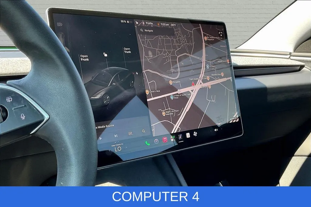 Tesla Model 3 photo 7