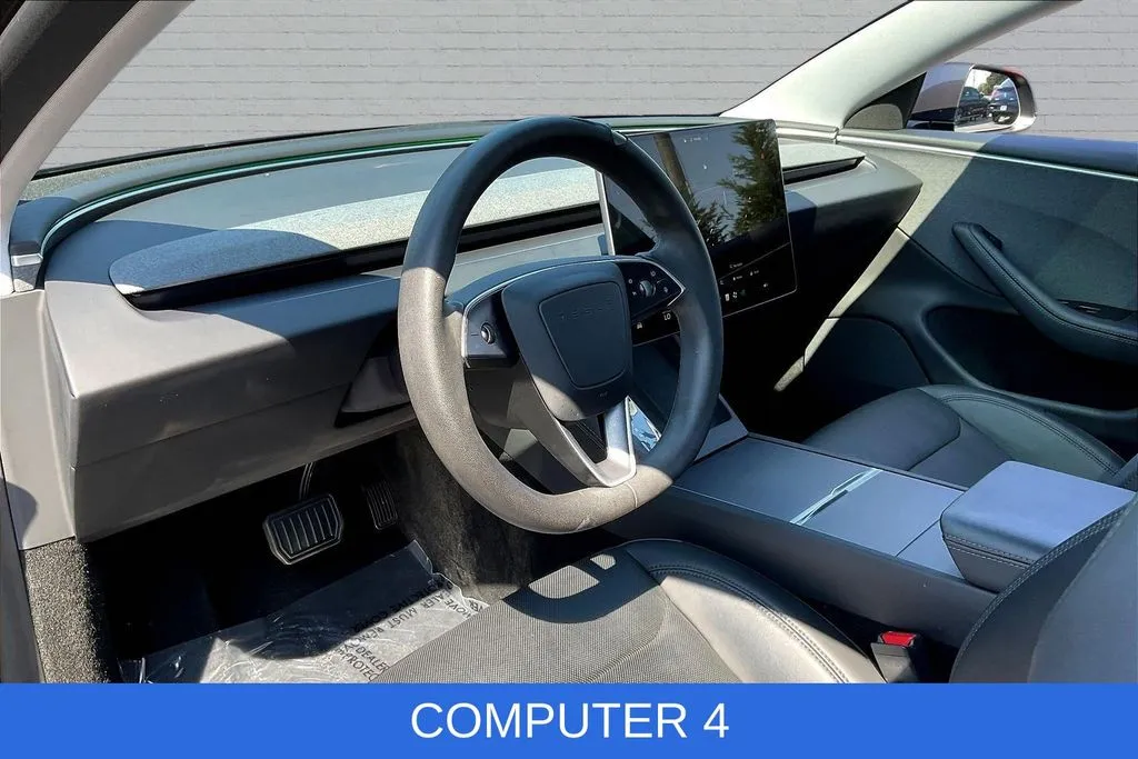 Tesla Model 3 photo 14