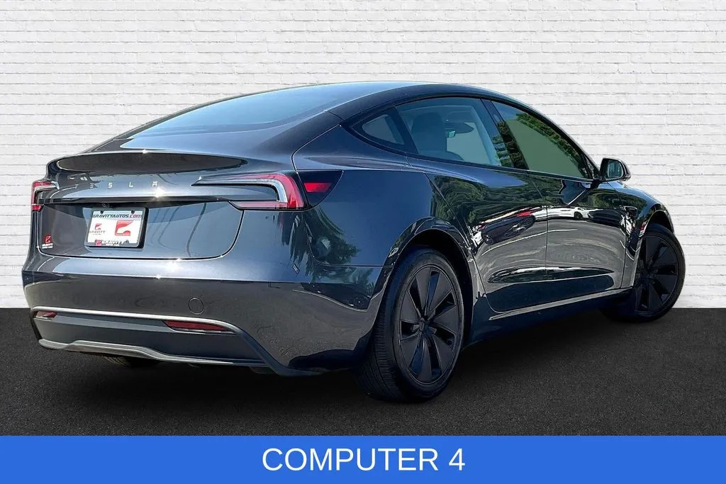 Tesla Model 3 photo 6