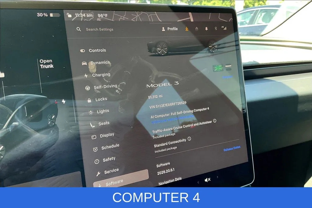 Tesla Model 3 photo 11