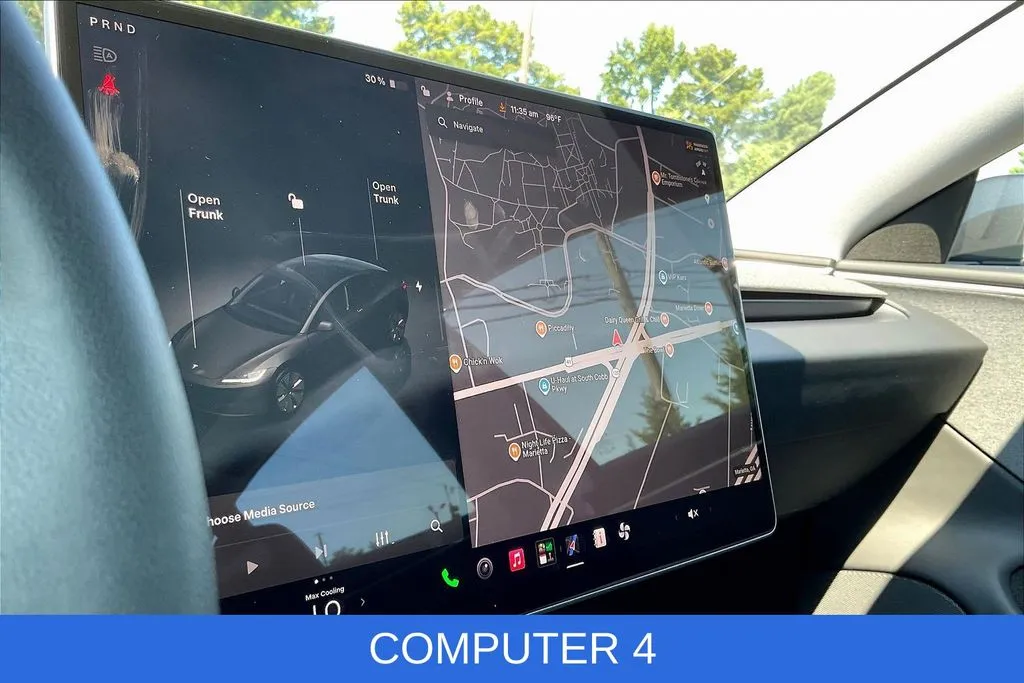 Tesla Model 3 photo 13