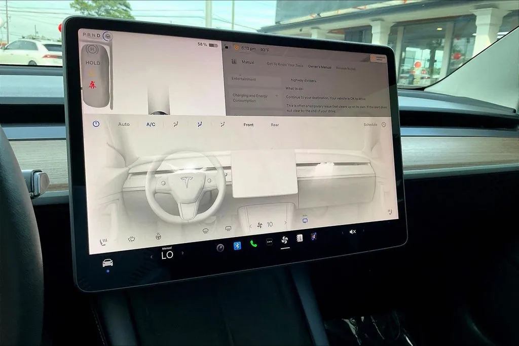 Tesla Model 3 photo 12