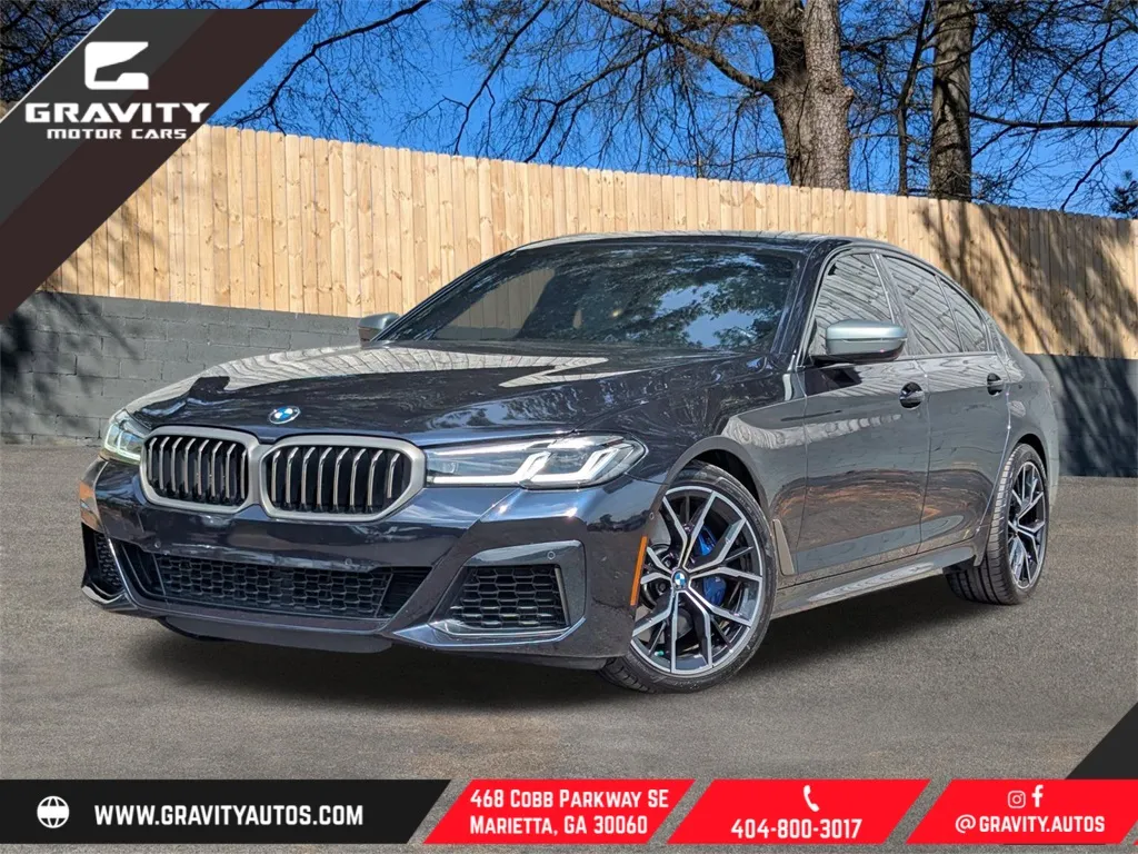 Black 2022 BMW 5 Series M550i xDrive for sale in Marietta, GA