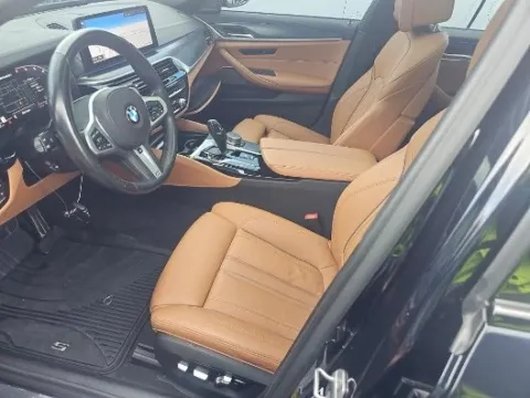 Another view of 2022 BMW 5 Series M550i xDrive for sale in Marietta, GA at Gravity Motor Cars