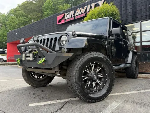 Photos of 2013 Jeep Wrangler Unlimited Sahara for sale in Sandy Springs, GA at Gravity Autos Sandy Springs