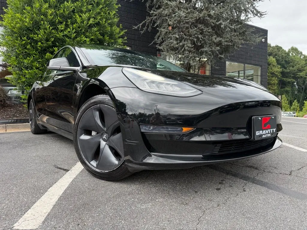 Tesla Model 3 photo 8