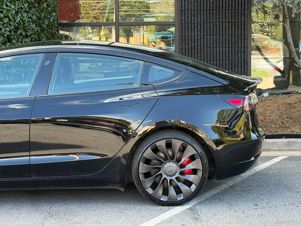 Tesla Model 3 photo 11