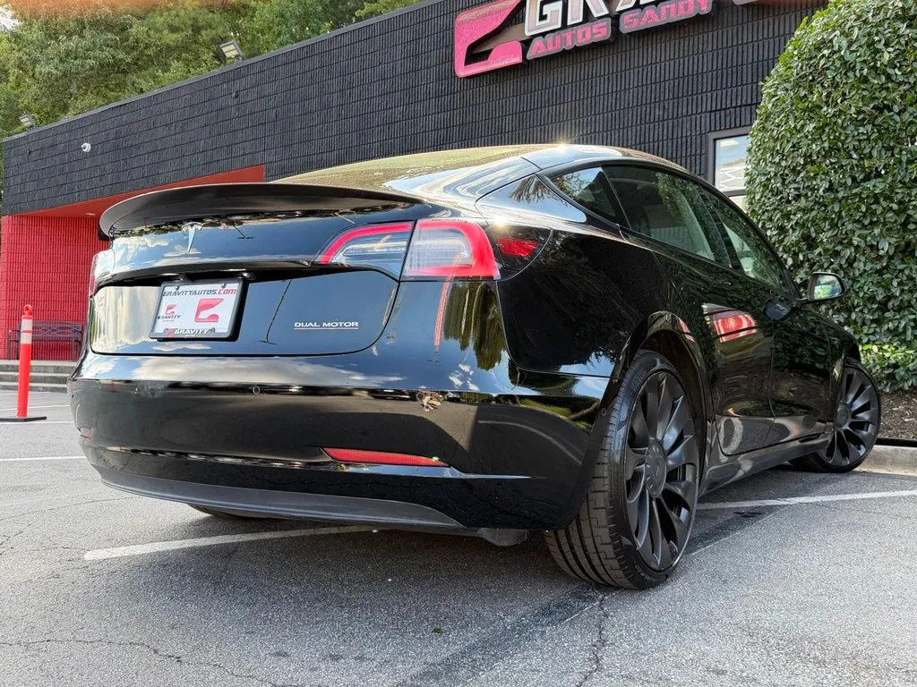 Tesla Model 3 photo 13