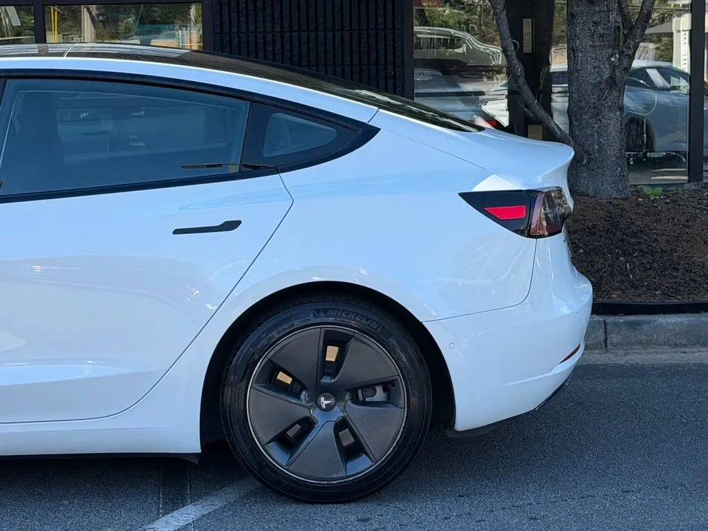 Tesla Model 3 photo 11