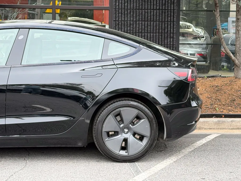 Tesla Model 3 photo 11