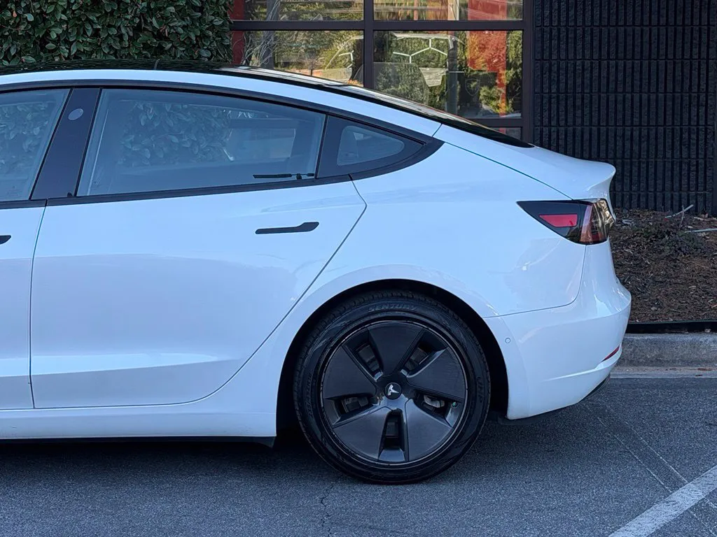 Tesla Model 3 photo 11