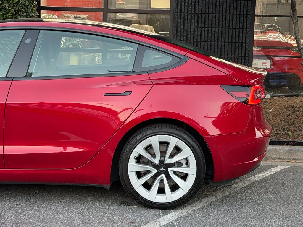 Tesla Model 3 photo 11
