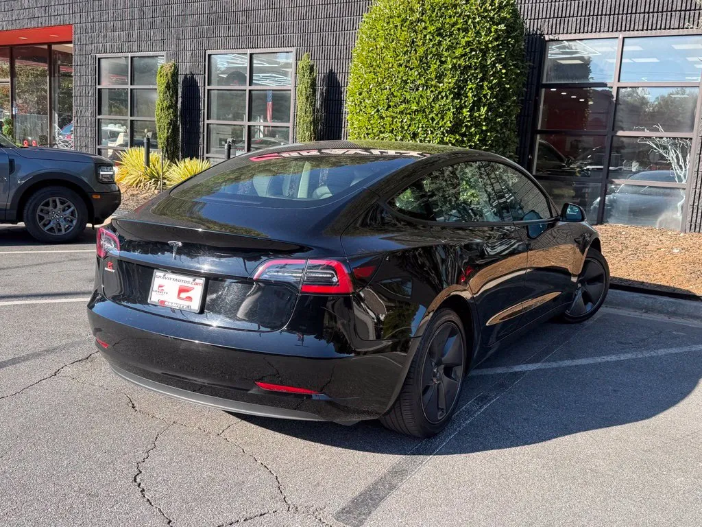 Tesla Model 3 photo 11